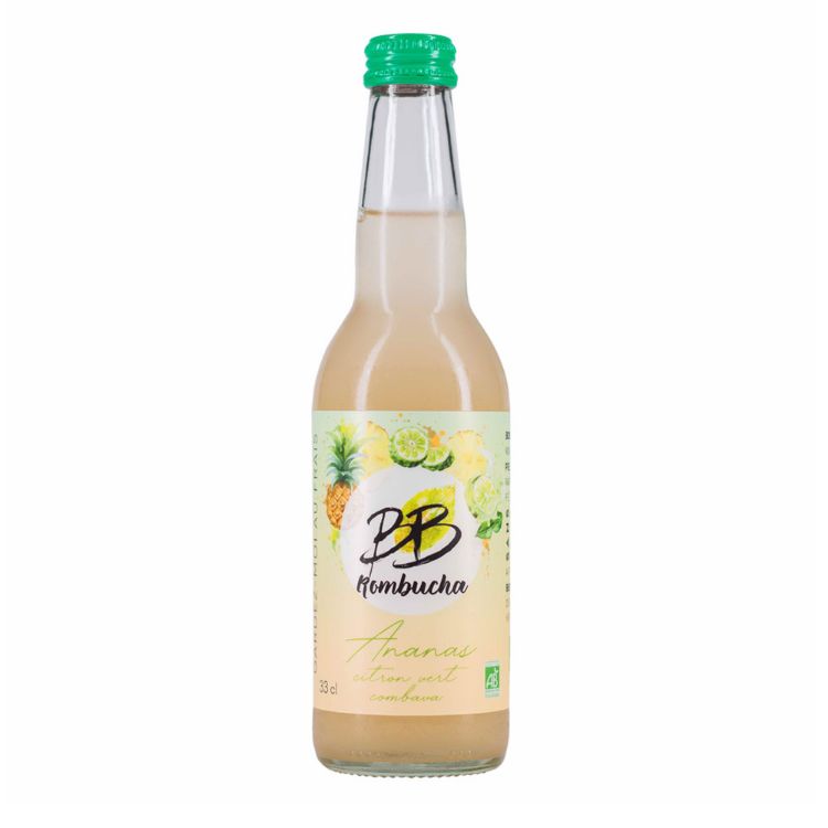 La kombucha est une boisson pétillante à base de thé fermenté, aromatisée ananas citron vert combava